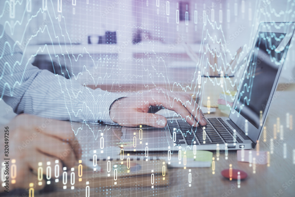 Multi exposure of stock market chart with man working on computer on background. Concept of financial analysis.