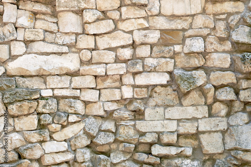 Cobblestone retro wall texture, masonry background of large stones