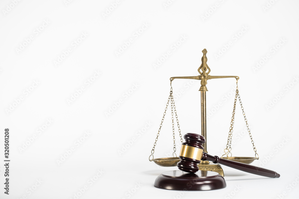 Law and justice concept. White background with copy space. Law and justice concept. White background with copy space.