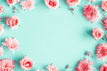 Flowers composition. Rose flowers on blue background. Valentines day, mothers day, womens day concept. Flat lay, top view, copy space