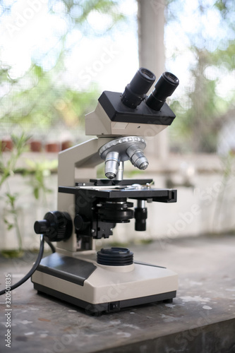 microscope on black background