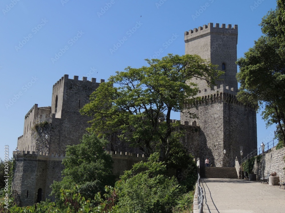 Obraz premium Erice – Venus Castle view from the road inside the gardens of Balio Tower