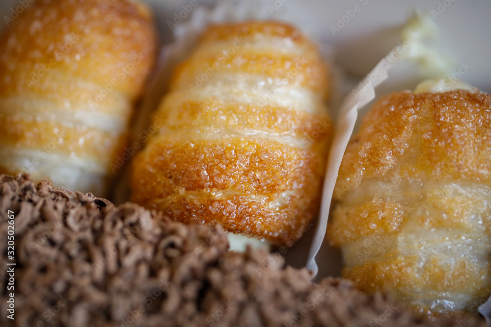 Shallow depth of field (selective focus) and macro image with a cannoli like dessert.