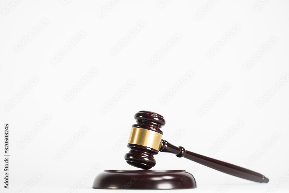 Judge's gavel. Law and justice concept. White background with copy space. Judge's gavel. Law and justice concept. White background with copy space.