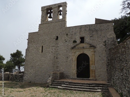 Erice – Church of  Sant'Orsola facade with the bell tower photo