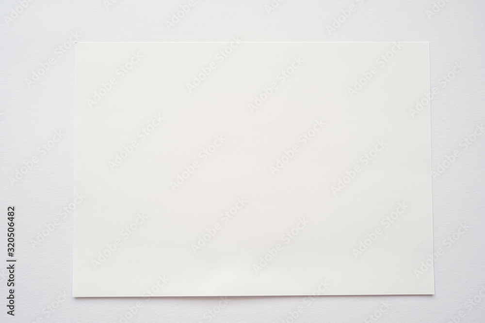Top View White Empty Paper on Light Background Top View White Empty Paper on Light Background