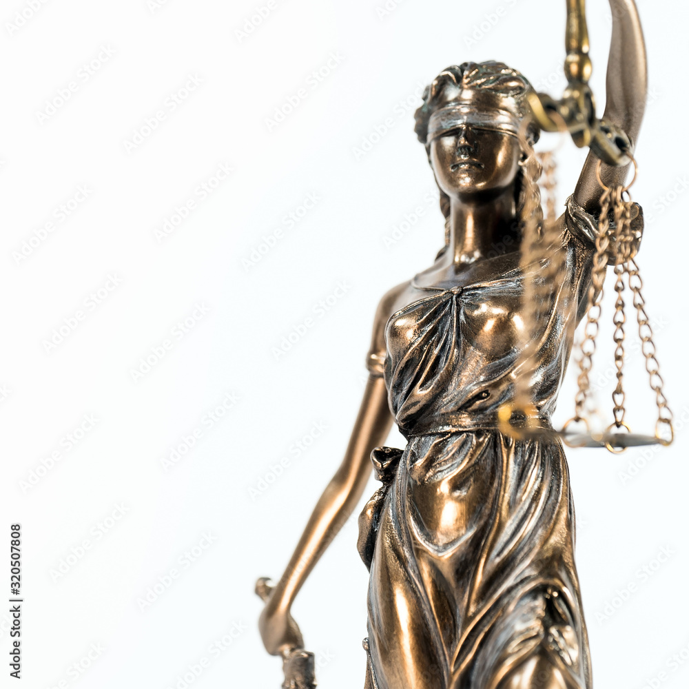 Statue of justice. Law and justice concept. White background with copy space.