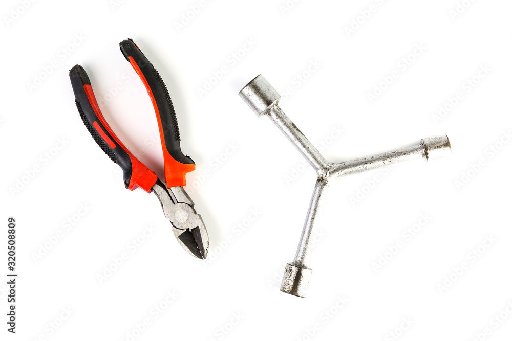Tool set of wrench, adjustable spanner, pliers and screwdriver isolated on white background Tool set of wrench, adjustable spanner, pliers and screwdriver isolated on white background