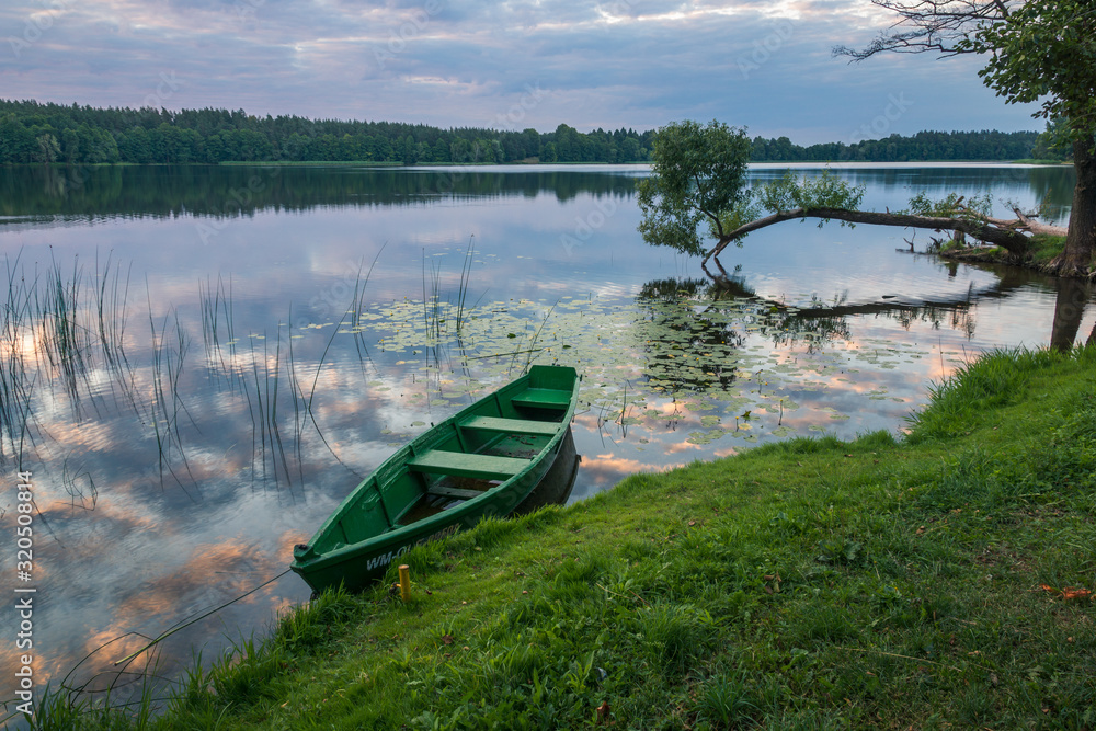 Boat on the Olecko Wielkie lake in Olecko, Masuria, Poland