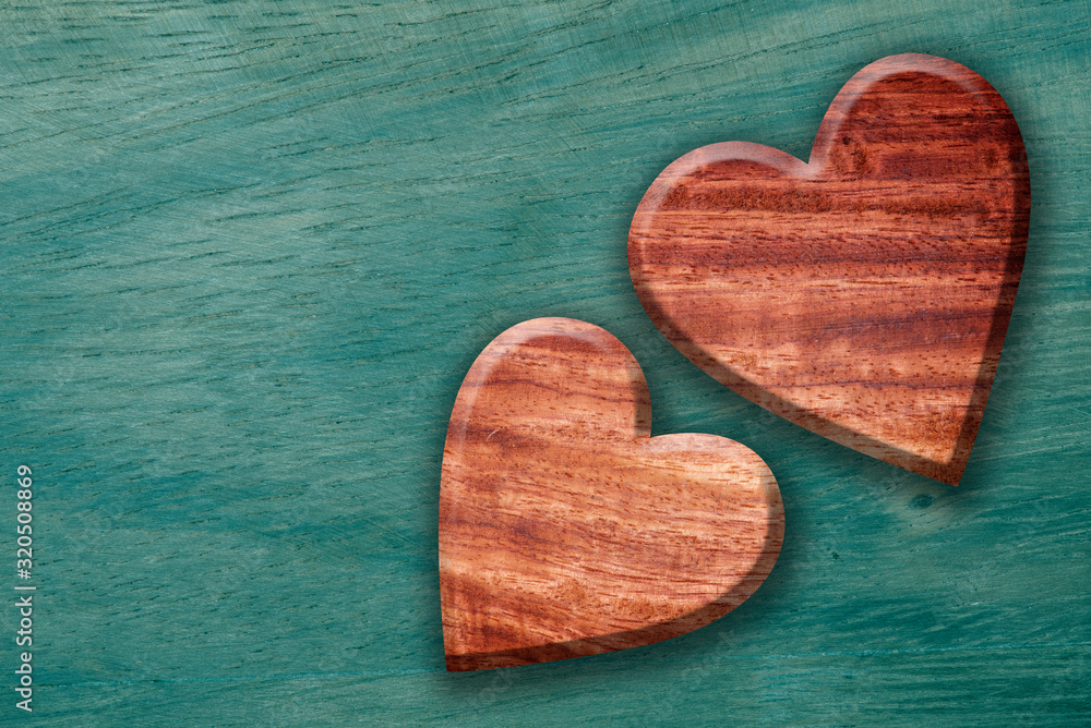 Obraz premium Two wooden heart shaped ,Wood heart shape background.