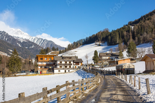 Alto Adige - Ahrntal - Luttach. Alpine farmhouses. Winter time, january 2020.  photo