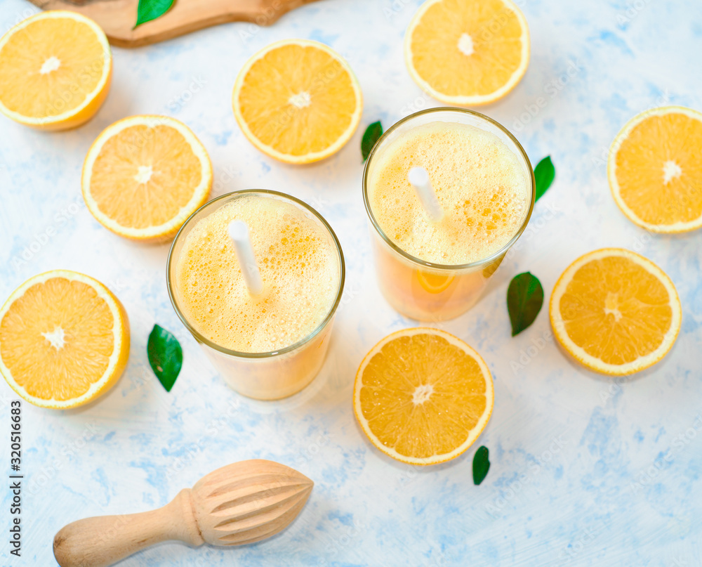 orange juice in a glass, top view, slices of oranges, straw, healthy lifestyle concept orange juice in a glass, top view, slices of oranges, straw, healthy lifestyle concept