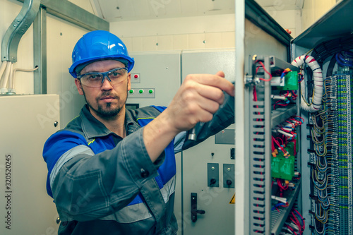 Photos Energy and electricity, electromechanical protective at work with an electric pa