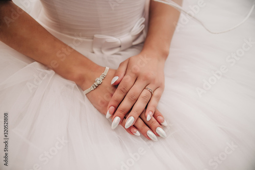 Gel nails on the hands of a woman