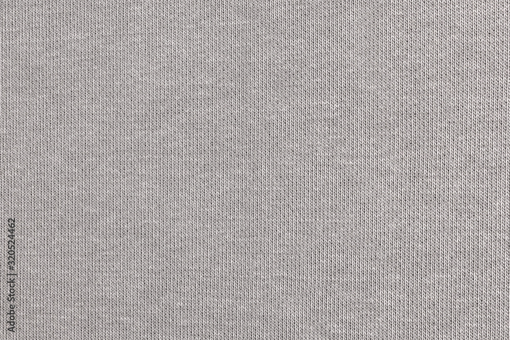 White natural texture of knitted wool textile material background. White cotton fabric woven canvas texture