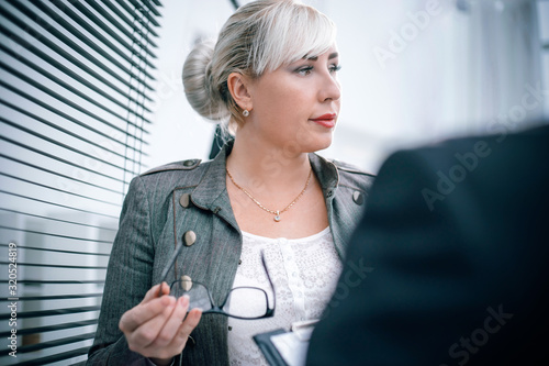 close up. successful businesswoman explaining something to her colleague.