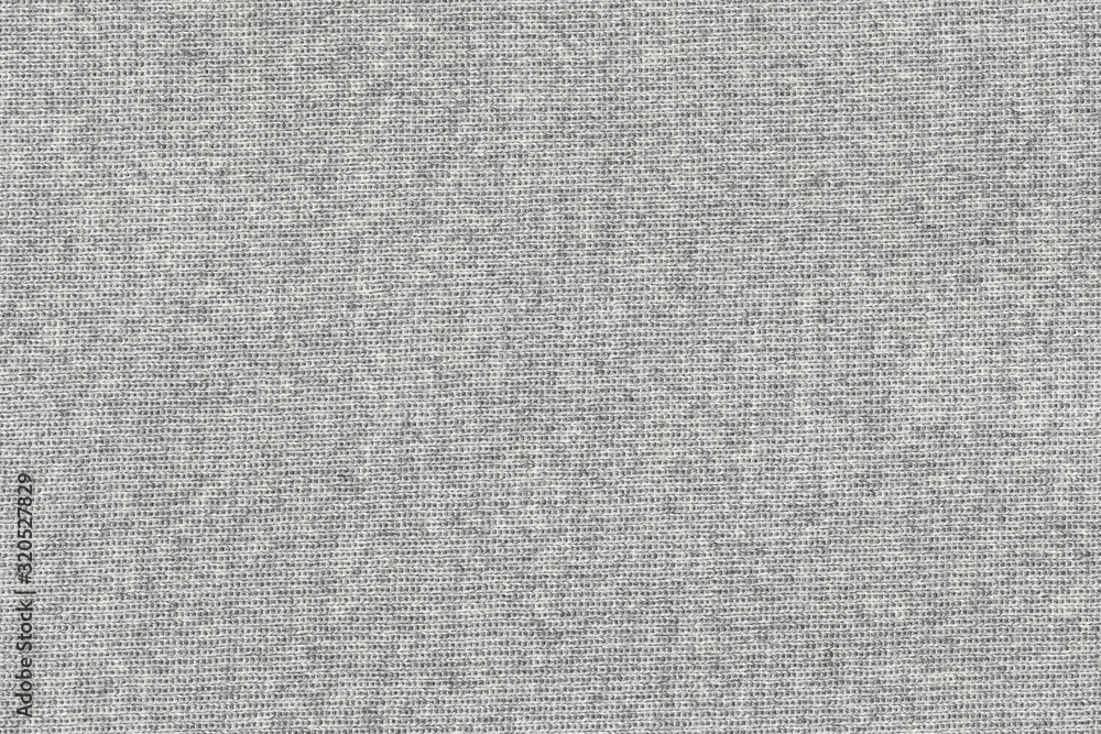 White natural texture of knitted wool textile material background. White cotton fabric woven canvas texture White natural texture of knitted wool textile material background. White cotton fabric woven canvas texture