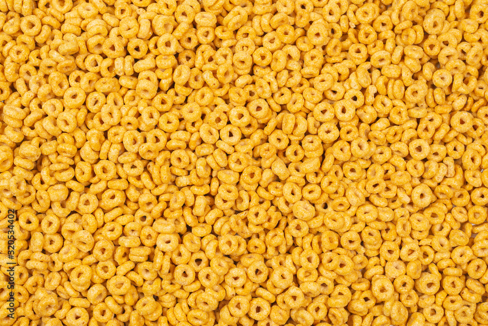Corn-flakes background and texture. Top view. Corn-flakes background and texture. Top view.