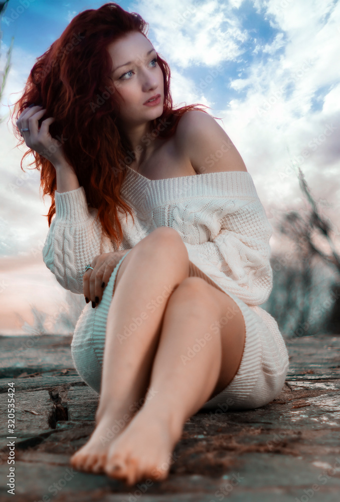 A beautiful woman with red hair A beautiful woman with red hair