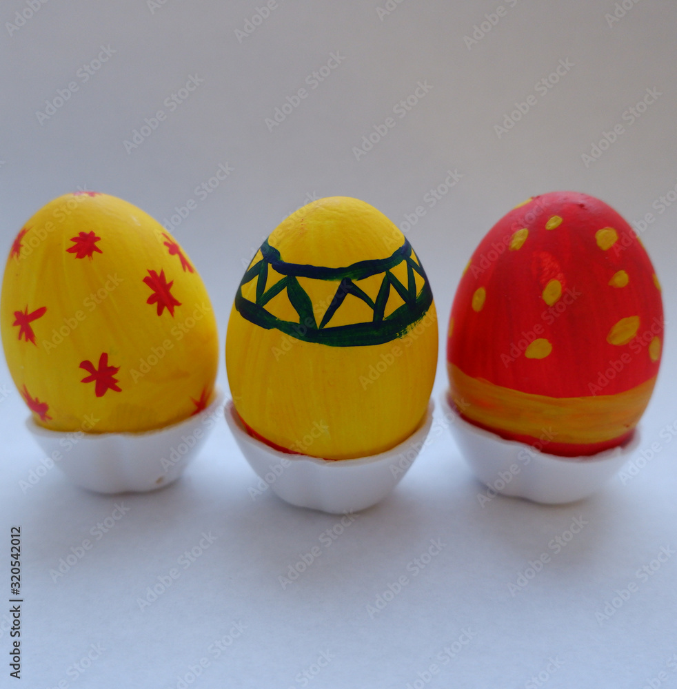 multicolored Easter eggs on a green background