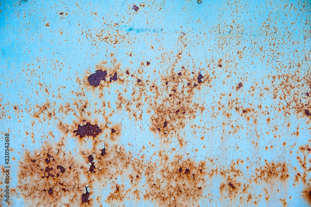 Abstract background of old rusty wall with scraps of blue paint Abstract background of old rusty wall with scraps of blue paint