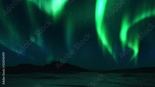 Spectacular 4K Animation of realistic and bright Aurora Borealis phenomenon. Timelapse video of Polar Light or Northern Light in night sky. Solar wind. Mountains and snow with reflection effect