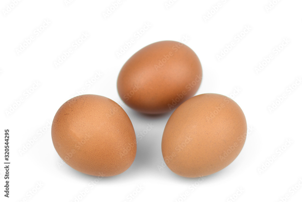 Three brown eggs separated with isolated from the white background Three brown eggs separated with isolated from the white background