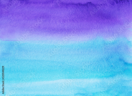 Watercolor blue and purple background painting texture. Blue and violet ombre watercolour backdrop. Stains on paper.