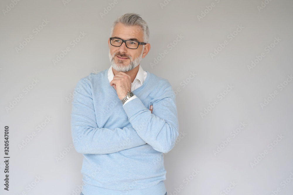 Portrait of 40 year old man, isolated on grey background Portrait of 40 year old man, isolated on grey background