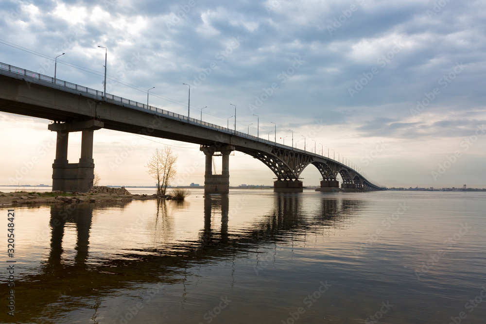 Bridge over the river Volga in sunset. The bridge connects Saratov and Engels. Russia