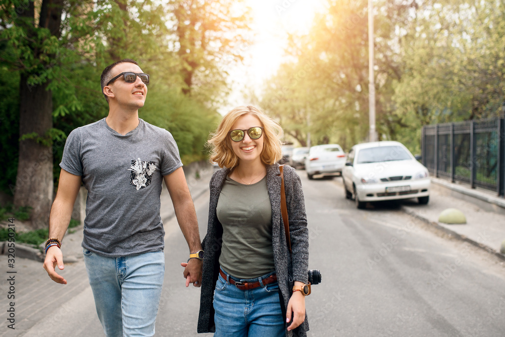 Couple walk around the city in spring Couple walk around the city in spring