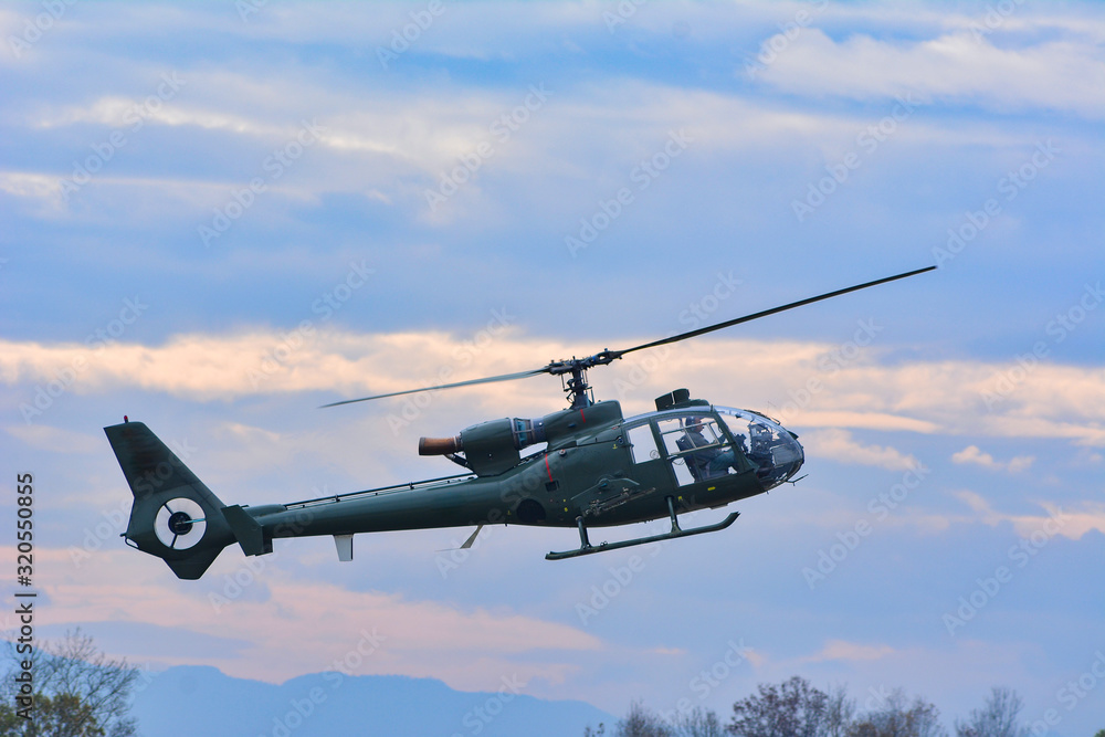 Fototapeta premium Military helicopter flying