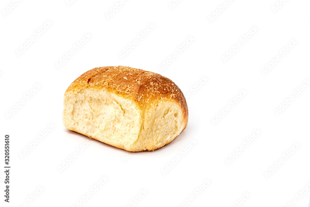 Bun of yeast dough on a white background