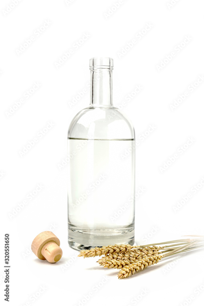 Glass bottle with liquid, a cover on a white background Glass bottle with liquid, a cover on a white background