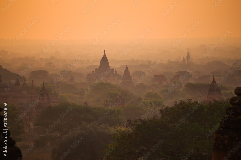 Foggy sunrise over the ancient pagodas of Bagan
