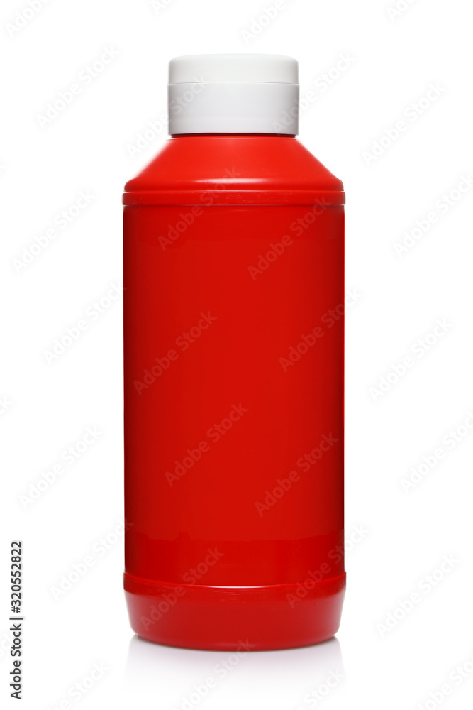 Red plastic ketchup bottle, isolated on white background Red plastic ketchup bottle, isolated on white background