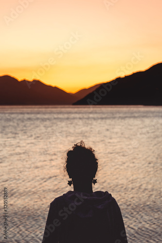 silhouette of woman at sunset © Stuart