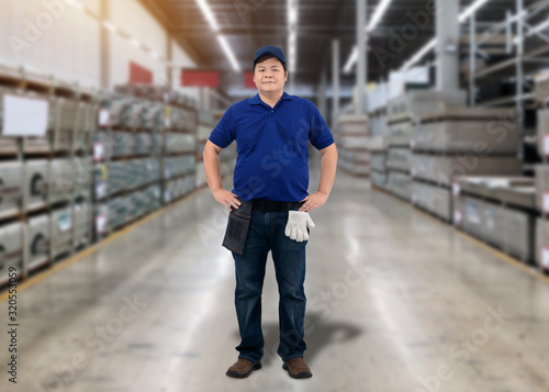 Portrait of male staff warehouse operator