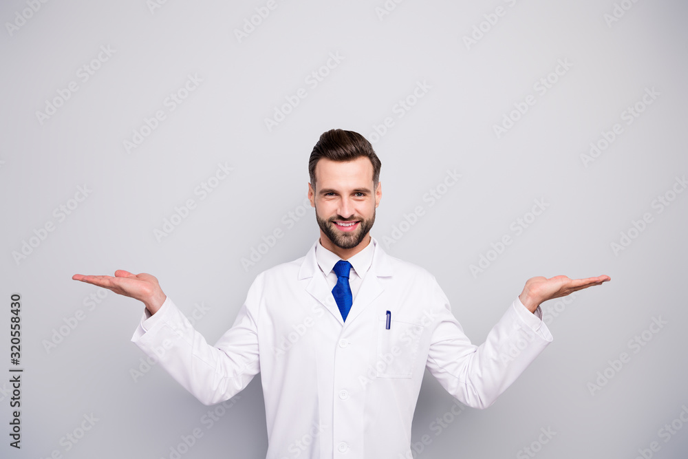 Portrait of his he nice attractive cheerful cheery doc holding on palms copy space new solution alternative traditional method isolated on light white gray pastel color background Portrait of his he nice attractive cheerful cheery doc holding on palms copy space new solution alternative traditional method isolated on light white gray pastel color background