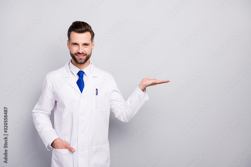 Portrait of his he nice attractive cheerful cheery doc biologist holding on palm copy empty blank space new solution isolated on light white gray pastel color background Portrait of his he nice attractive cheerful cheery doc biologist holding on palm copy empty blank space new solution isolated on light white gray pastel color background