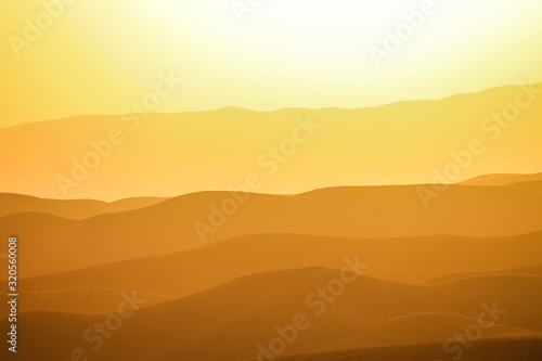 Layered golden sunset in the Pamir mountains of Tajikistan © nelasova