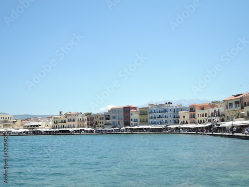 Beautiful cityscape and promenade in city of Chania on island of Crete, Greece © Yulia