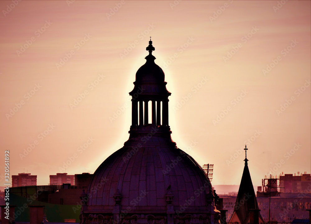 City building with dome in beautiful pastel sunset