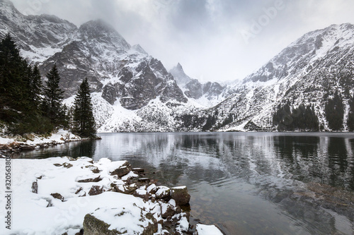Beautiful winter at Eye of the Sea lake in in Tatra mountains, Poland