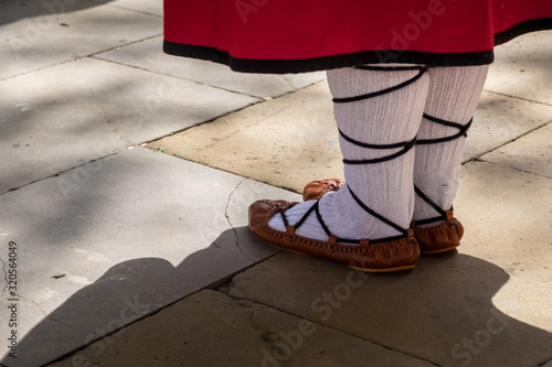 A young woman dressed in a traditional Basque dancing costume