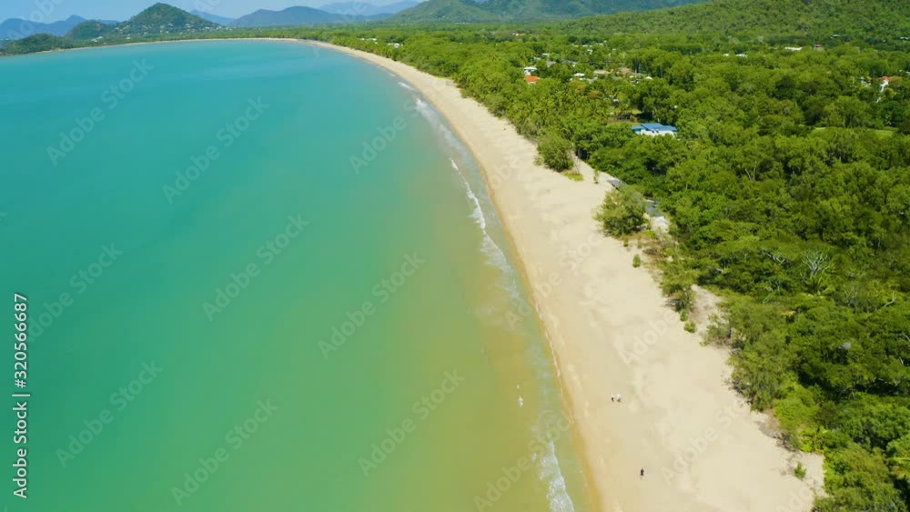 Aerial, beautiful view on huge sand beach and a coastline in Palm Cove, Cairns in Queensland, Australia Aerial, beautiful view on huge sand beach and a coastline in Palm Cove, Cairns in Queensland, Australia