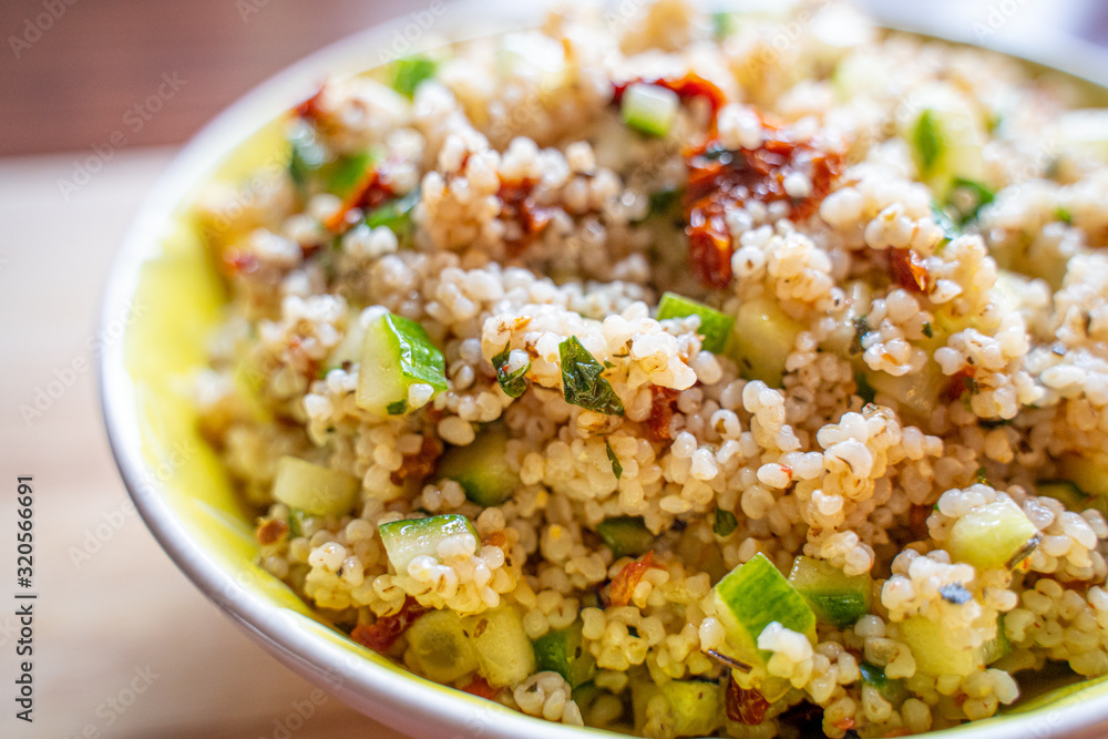 Healthy Salad with Barley, Sun Dried Tomatoes, Cucumber, Lemon Juice, Olive Oil and Herbs Healthy Salad with Barley, Sun Dried Tomatoes, Cucumber, Lemon Juice, Olive Oil and Herbs