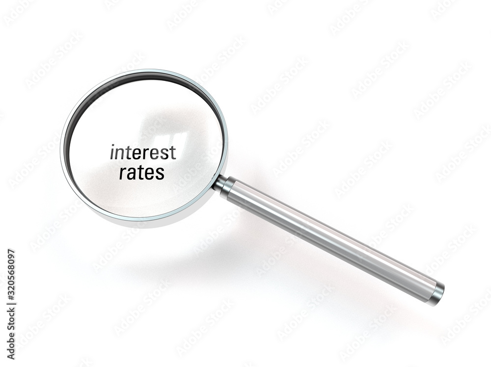 loupe or magnifier with interest rates in focus isolated on white background - conceptual image concerning actual policies of low interest rates loupe or magnifier with interest rates in focus isolated on white background - conceptual image concerning actual policies of low interest rates