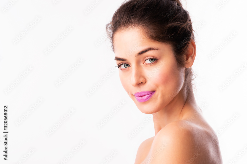 Close-up portrait of beautiful young woman face with purple lipstick Close-up portrait of beautiful young woman face with purple lipstick