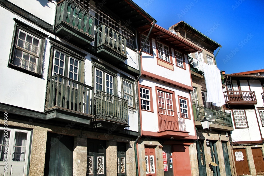 Streets, squares and facades of the portuguese medieval village of Guimaraes Streets, squares and facades of the portuguese medieval village of Guimaraes